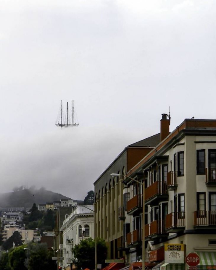 22 Stunning Natural Optical Illusions, a sailboat in the sky