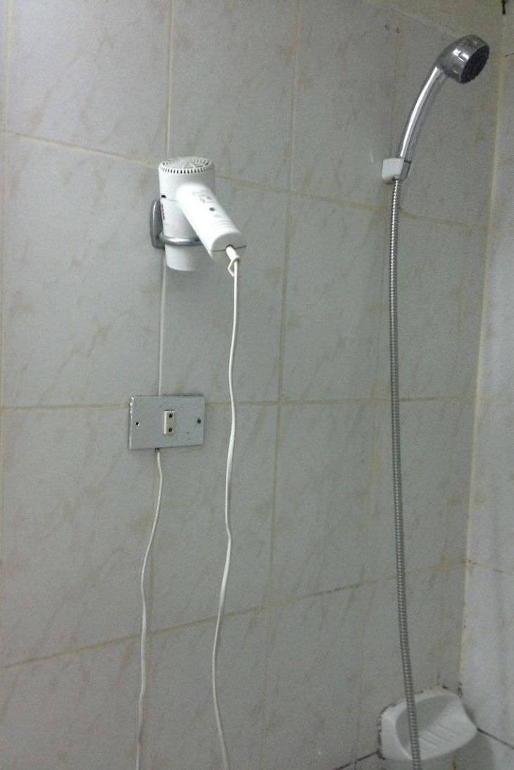 Hotels Rooms That Are So Terrible They’re Funny, hair dryer and shower