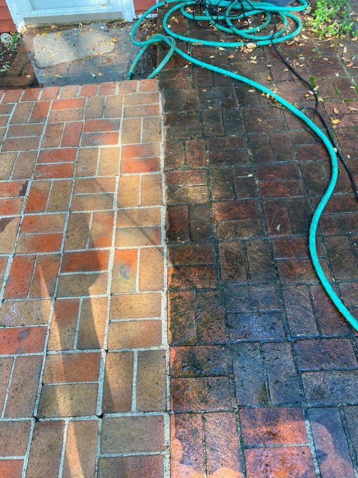 Power Washing closeup pavement