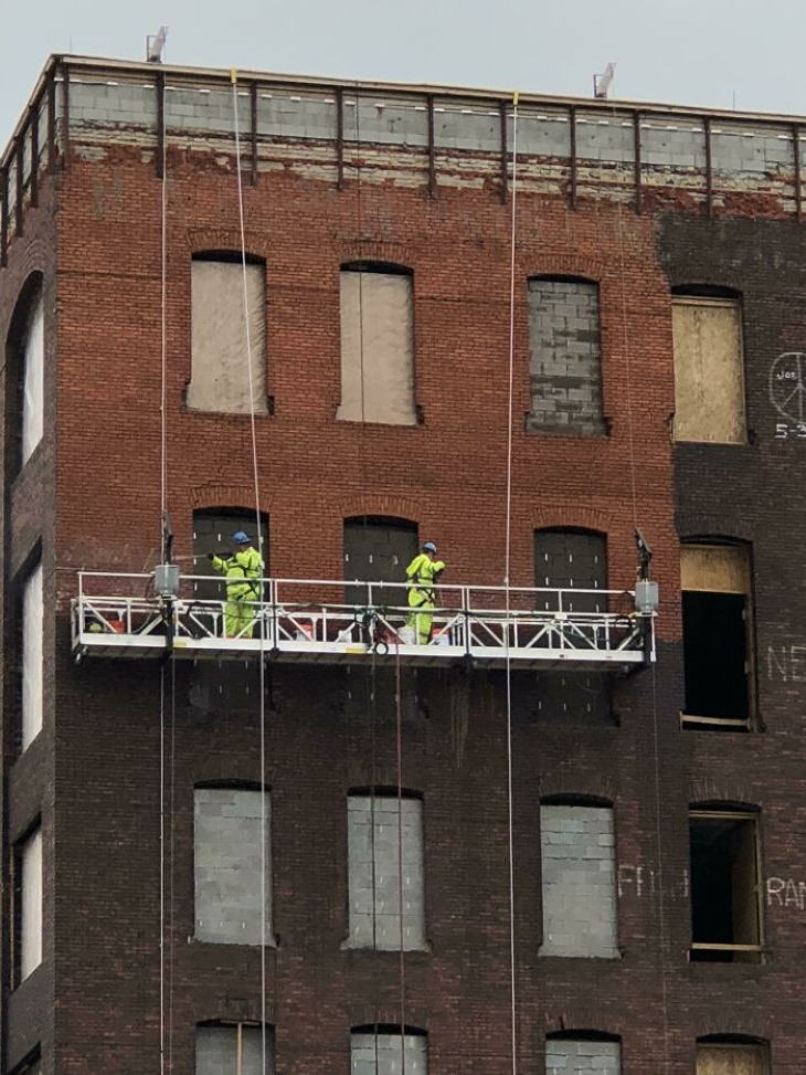 Power Washing old building renovation