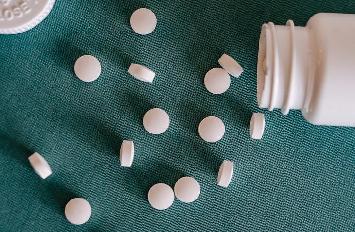 Taking Aspirin to Prevent Stroke bottle and pills