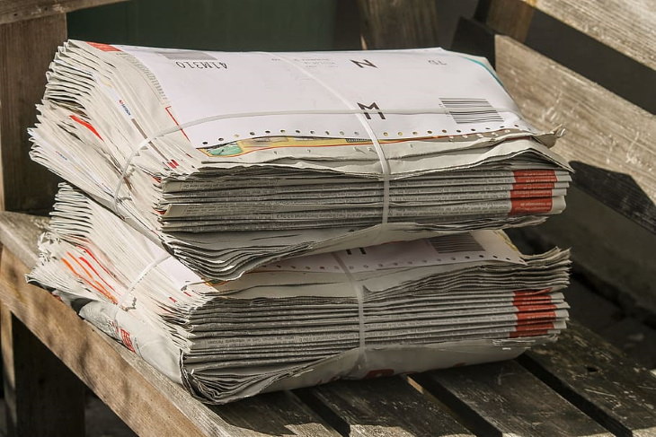 Newspapers Uses stack of papers