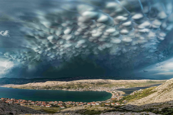 2021 Weather Photographer of the Year “Beautiful Mammatus Clouds above Pag Town” by Danijel Palčić (Croatia)