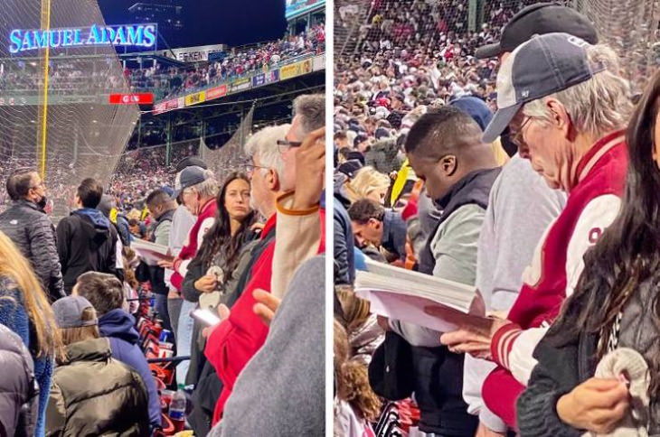 Jaw-Dropping Pictures Stephen King reading during Red Sox game