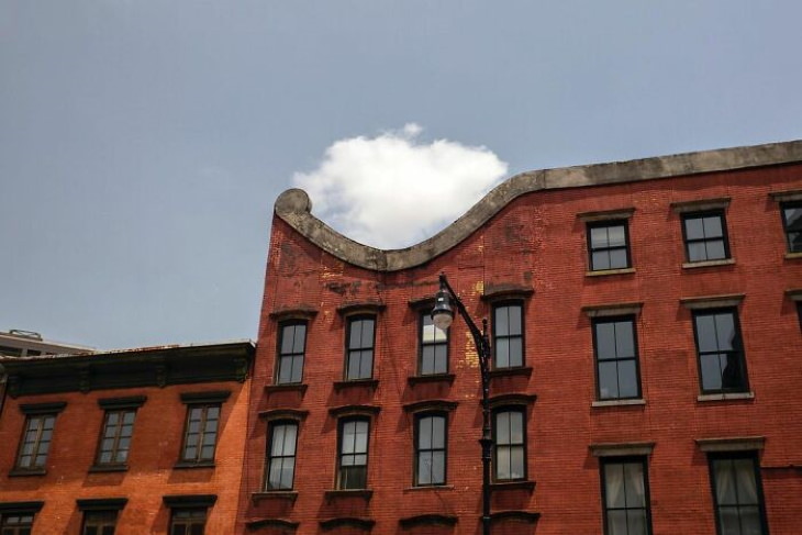 Well Timed Photos by Eric Kogan building and cloud