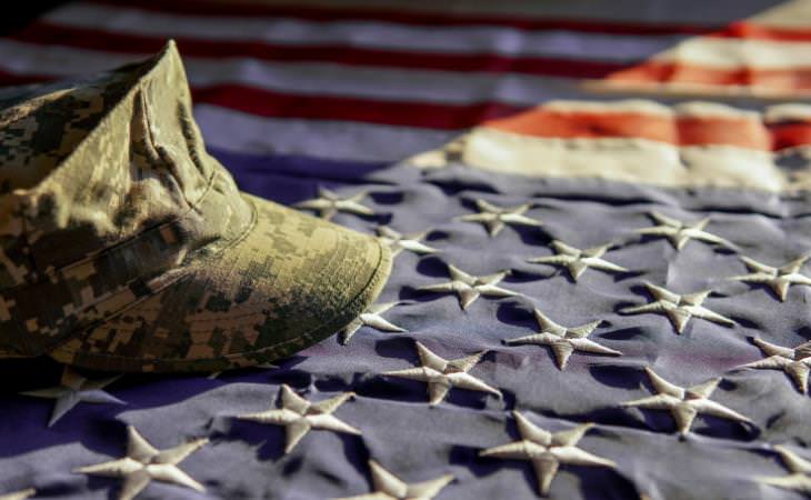 military hat on USA flag 