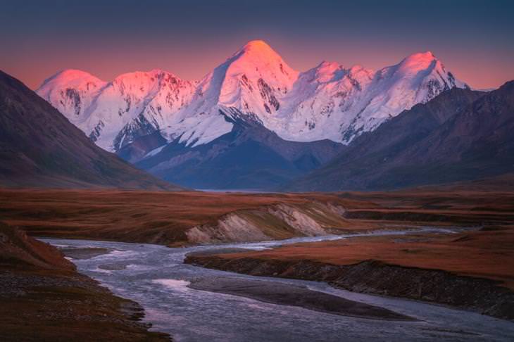 Kyrgyzstan by Albert Dros river and sunset in the mountains
