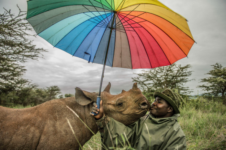 Kilifi the rhino and his Keeper Kamara by Ami Vitale