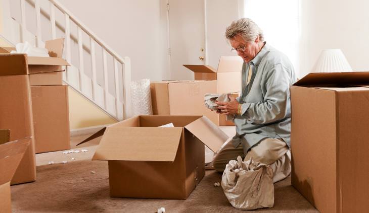 Elderly couple moving in to new home