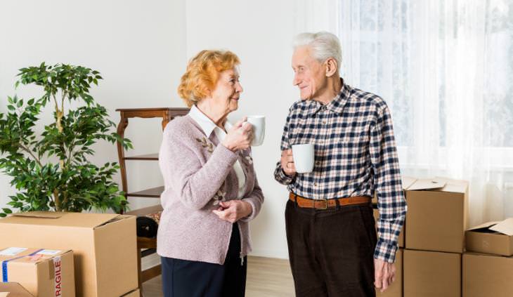 Elderly couple moving in to new home