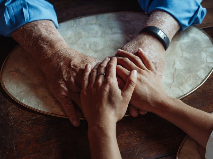 Family Friendly Dementia Activities two people holding hands