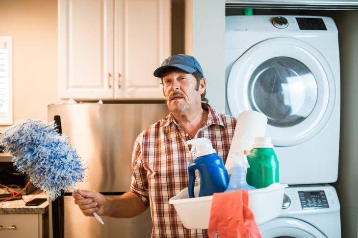 Quick Cleaning Tips man with a cleaning caddy