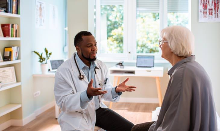 woman at male Doctor's appointment