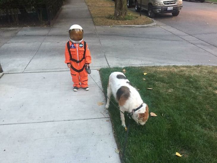 Adorable Friendships Between Kids & Their Dogs, boy walking dog in astronaut costume