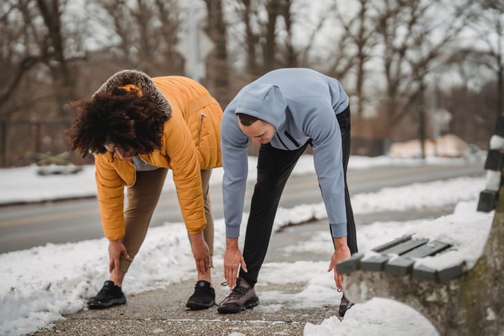 How to Shovel Snow Safely hamstring stretch