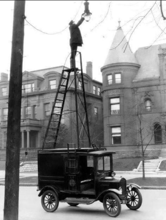 Work Safety Fails Changing street lights, circa 1910