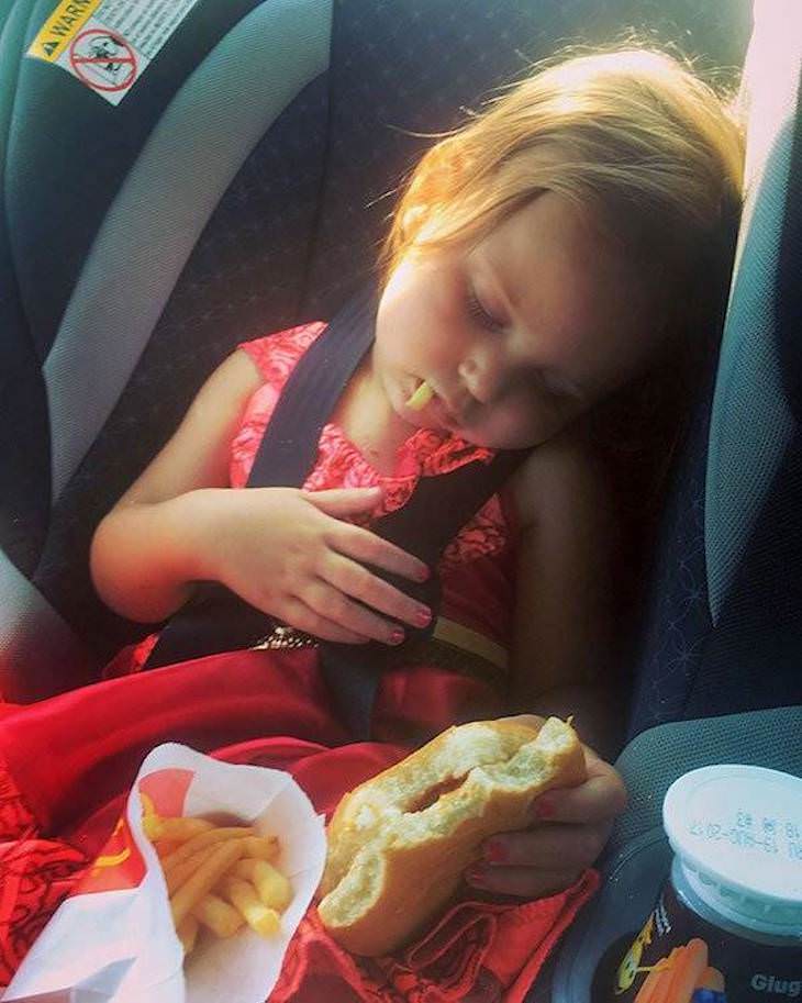 18 Photos of Kids in Hilariously Weird Situations, falling asleep while eating mcdonalds