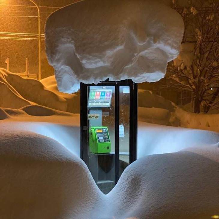 21 Stunning Spots Around the World, phone booth in the snow