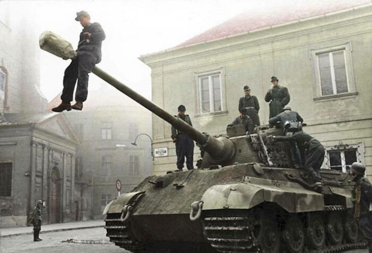 Rare and Beautifully Colorized Historical Photo  German and Hungarian soldiers from the 503rd Heavy Panzer Battalion on a Tiger II tank in Budapest, Hungary, October 1944