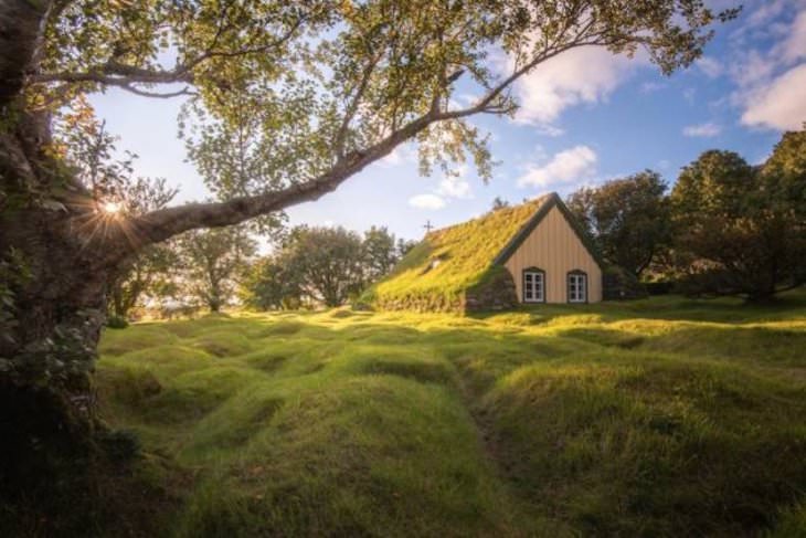 Beautiful Curiosities Around the World Hofskirkja, a 130 years old turf church in Iceland