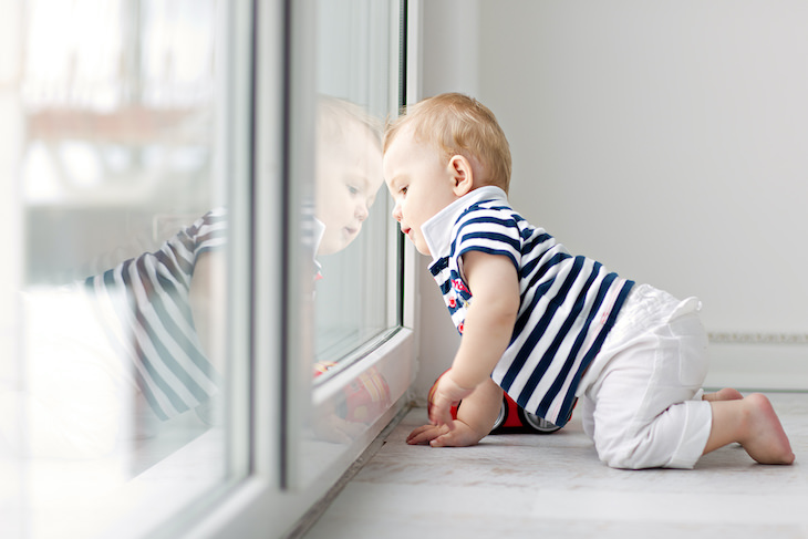 10 Common Household Items That Could Be Hazardous baby by the window