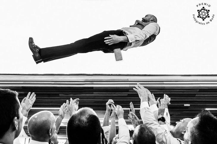 The FdB Awards' Top Wedding Photos of the Year groom thrown in the air