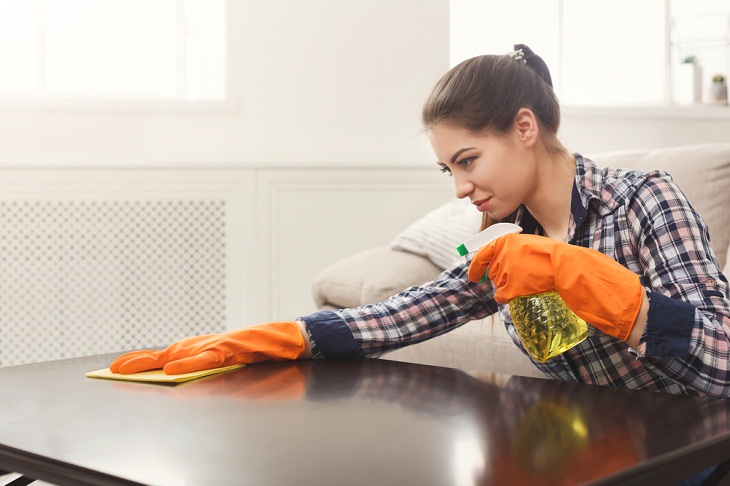 Things You Should Never Clean With Glass Cleaner,  Wooden Furniture 