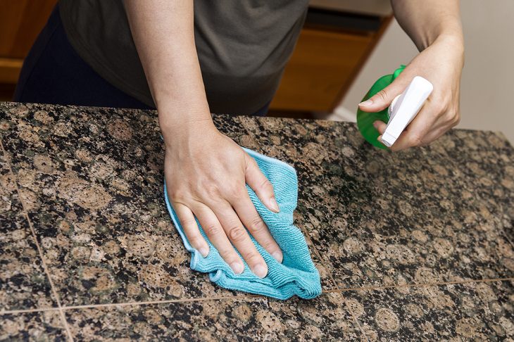 Things You Should Never Clean With Glass Cleaner, Granite or Marble Kitchen Countertops