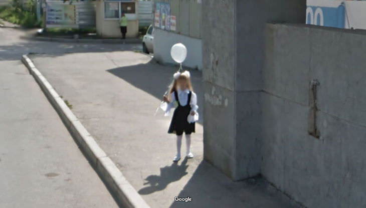 Unusual Images Caught in Google Street View girl with balloon