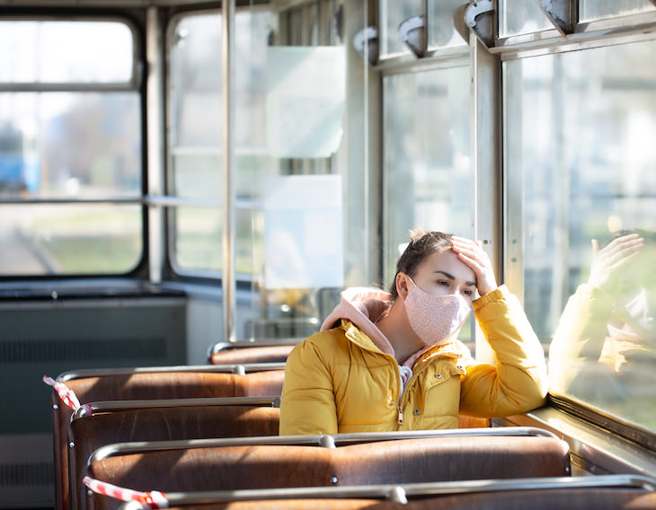 Molnupiravir: What’s Known About the New Covid-19 Pill? woman with mask on bus