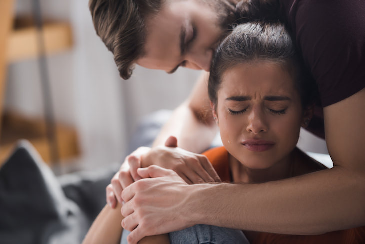 7 Effects Crying Has On Our Body and Mind man hugging crying girl