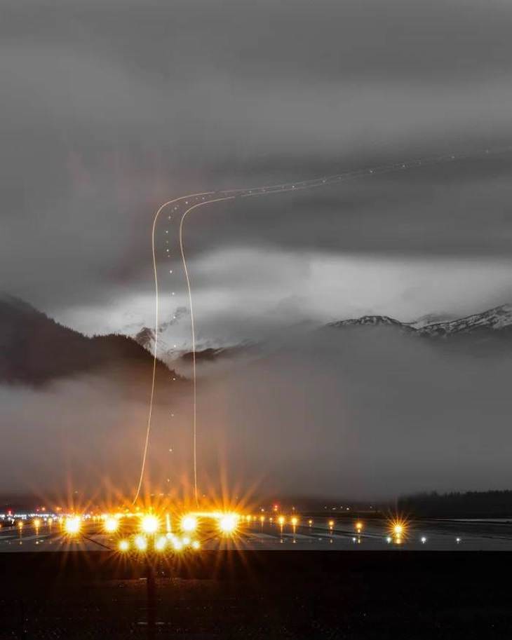 Extraordinary and Poignant Images Long exposure picture of a plane taking off.