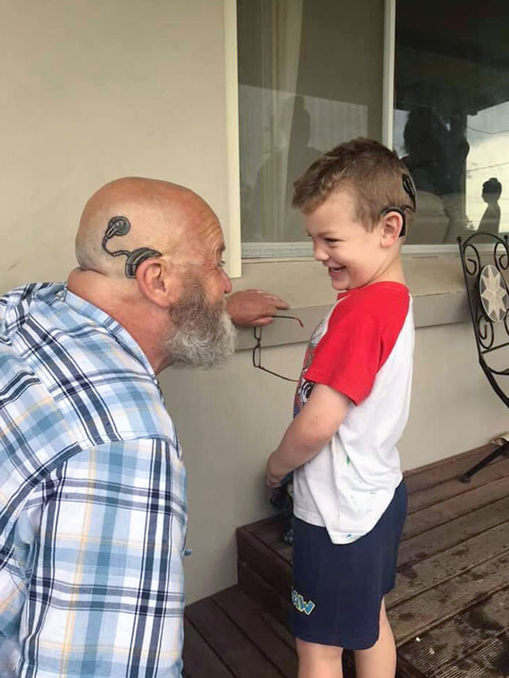 5. This grandad got a cochlea implant tattoo to become like his grandson.
