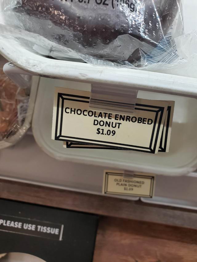 funny signs chocolate enrobed donuts