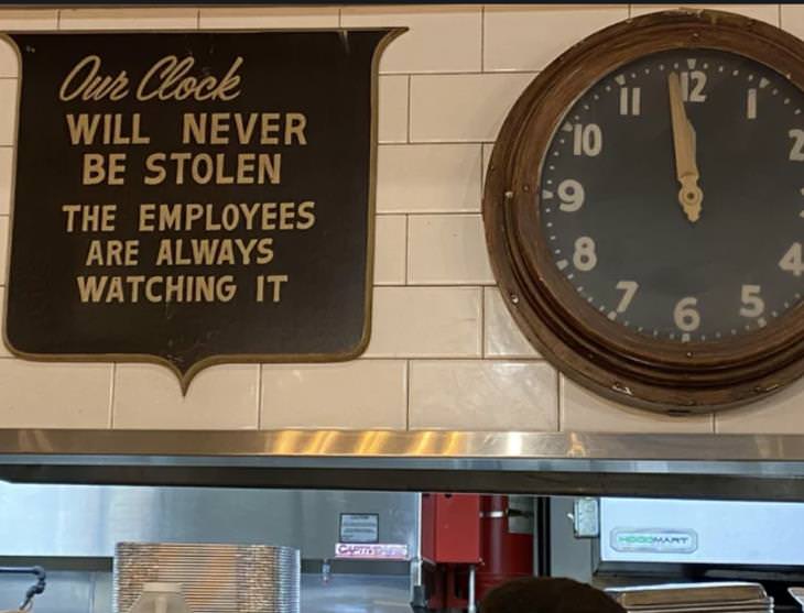 funny signs stolen clock