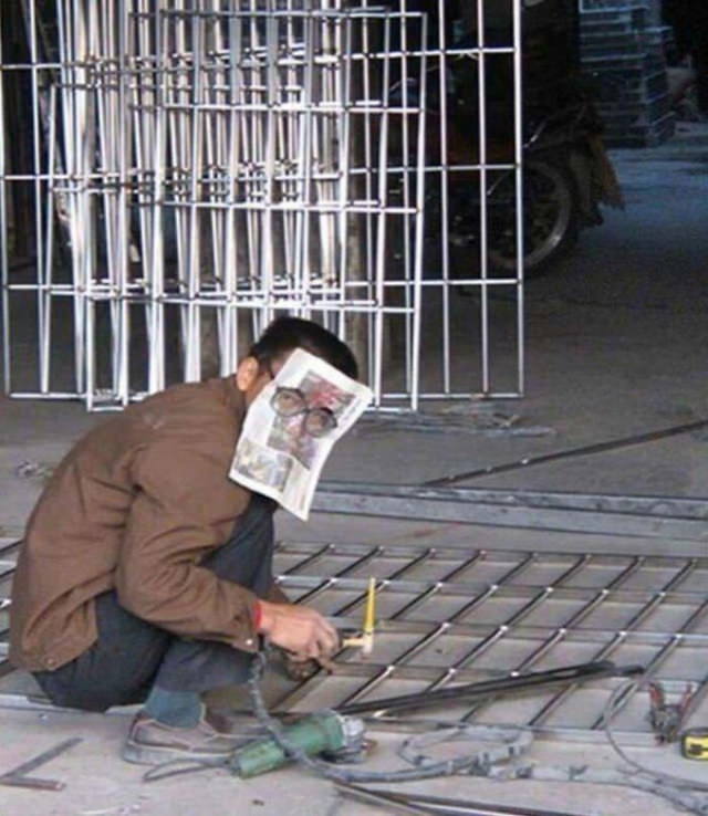 Construction Fails man with newspaper on face