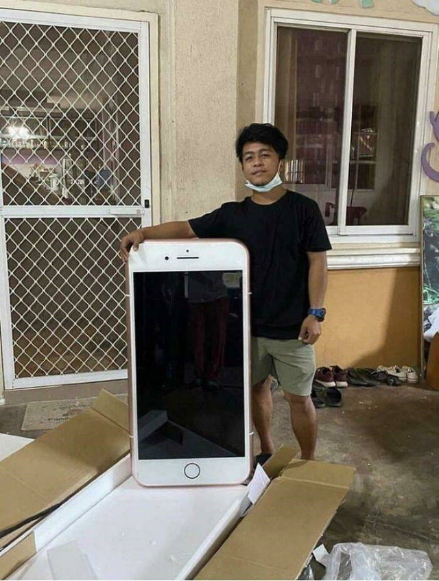 Online Shopping Fails a table shaped like an iPhone 