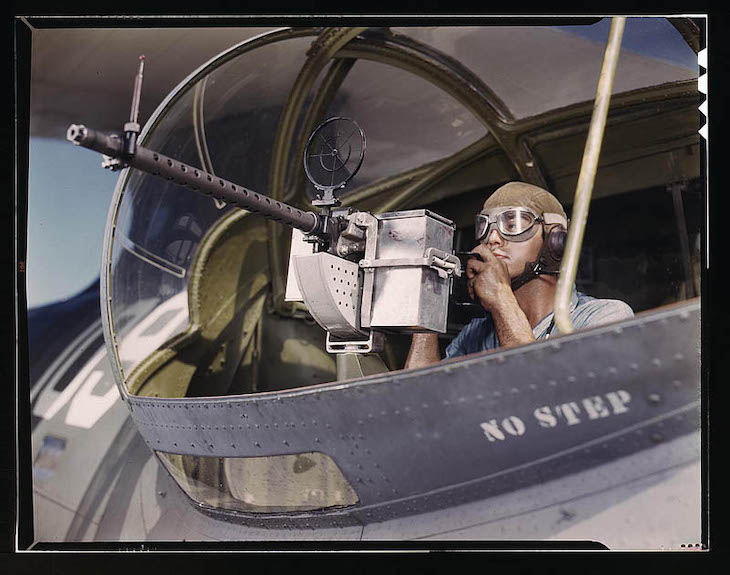 Historic Photos Depicting 1940s US in Vivid Color  Jesse Rhodes Waller tries out a 30-caliber machine gun