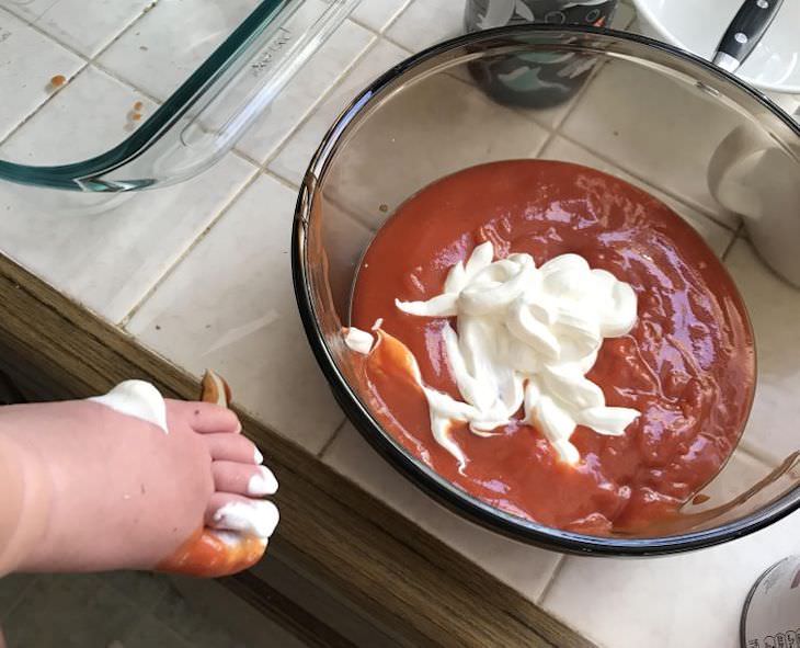 Funny Photos Capturing the Essence of Parenthood foot dipped in sauce