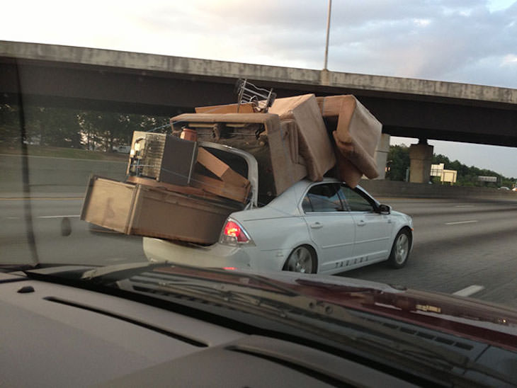 Bizarre and Stupid Driving Moments carrying sofa