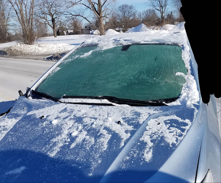 Bizarre and Stupid Driving Moments snowy windshield