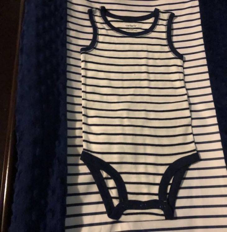 Accidental Camouflage baby bodysuit changing table