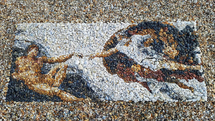 Recreation of Famous Artworks with Pebbles by Justin Bateman the creation of adam