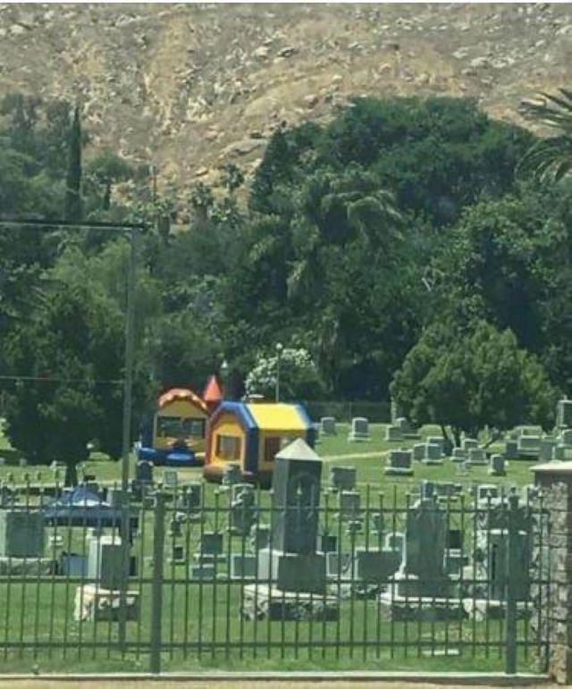 Bizarre Pictures bouncy castle in a cemetery