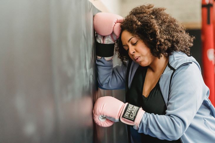 Exercising in the Summer Heat woman boxing tired