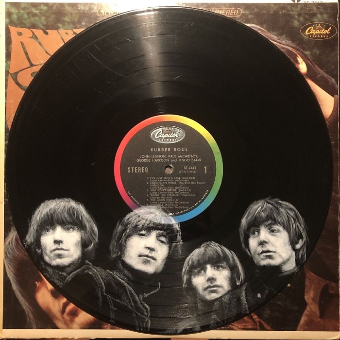 The Beatles painted on vinyl record