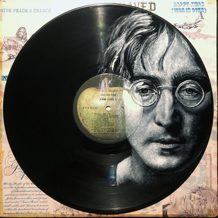 John Lennon painted on vinyl record