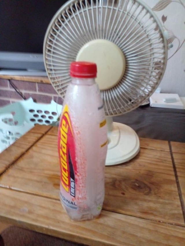  Clever Solutions a bottle of water in front of a fan