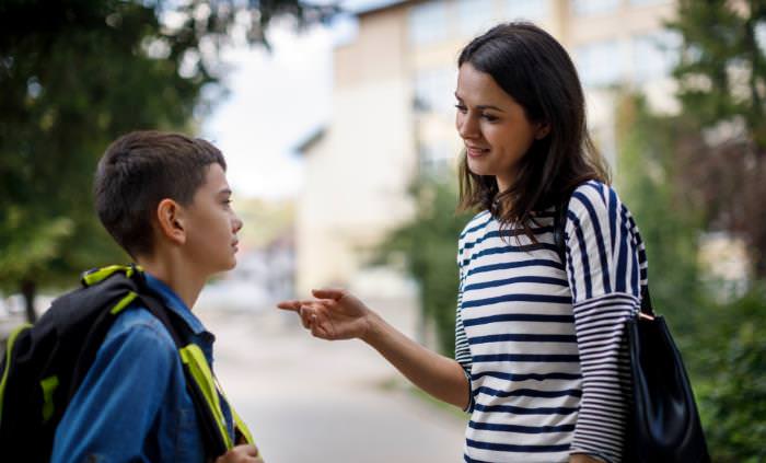 mother and son talking after school