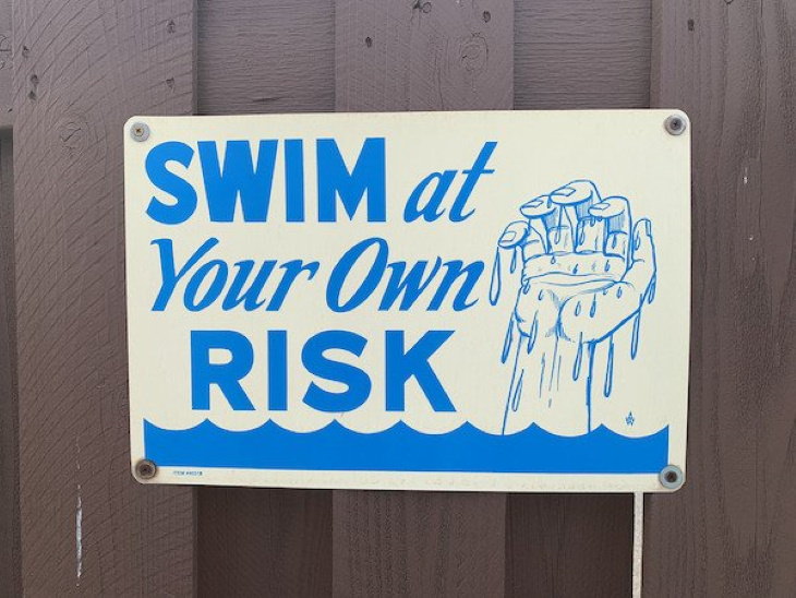 Funny Signs swim at your own risk